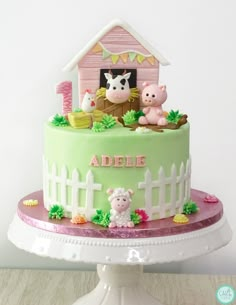 there is a cake that has animals on it