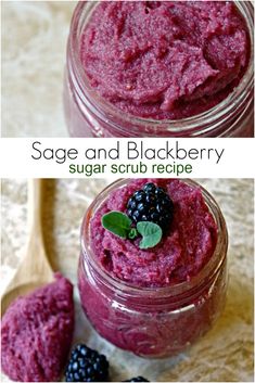 two jars filled with berries and blackberries on top of a table next to a spoon