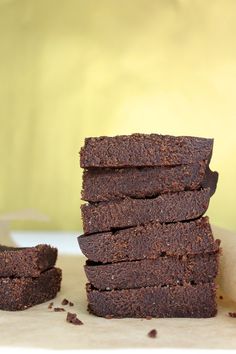 a stack of brownies sitting on top of a table