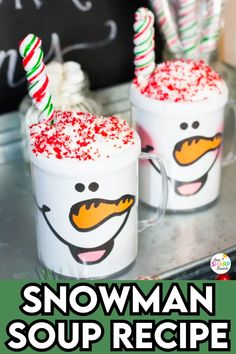 two mugs with red and green sprinkles on them, one is filled with snowman soup