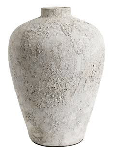 a large white vase sitting on top of a table