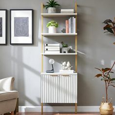 a white radiator sitting next to a living room filled with furniture and plants