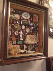 there is a framed picture with many different things on it