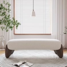 a living room scene with focus on the bench and window blinds in the back ground