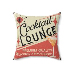 a red and white pillow with a cocktail lounge sign on it