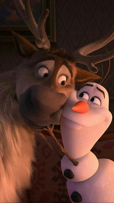 an animated character kissing another character with antlers on their heads in the film frozen ground