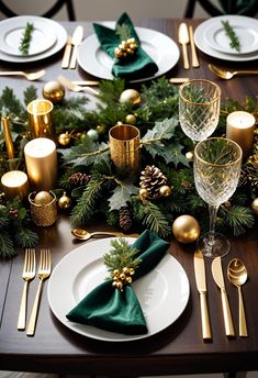 the table is set with gold and green decorations