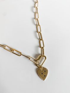 This is the Zoe thick chain paired with the carabiner clasp and a charm. Add any charm from the list to customize it! The image of the model wearing the necklace is a 16 inch chain, but please measure you neck for the best fit. all chains are 14k gold filled Carabiner is vermeil gold Heart Gift Wrapping, Charm Necklace Diy, Gold Jewelry Necklace, Gold Charm Necklace, Minimal Jewelry, Jewelry Lookbook, Heart Gifts, Jewelry Inspo, Gold Chain Necklace