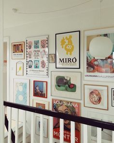 an instagram page with pictures on the wall and below it is a stair rail