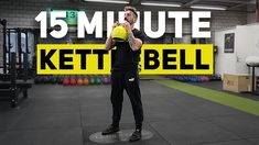 a man holding a yellow ball in a gym with the words 15 minute kettle bell