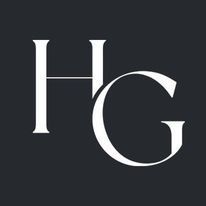 the hg logo is shown on a black background with white letters that spell it