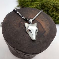 The wolf is one of the most striking in the realm of spirit animals. The power of the wolf brings forth instinct, intelligence, endurance, appetite for freedom, and awareness of the importance of social connections. Our adopted stray dog Luca modeled for this sculptural sterling silver pendant.  Looks great on both men and women.  You can order it with  *a beautiful thick (2.5mm) woven style chain. These have a gorgeous texture, very comfortable and durable. made of sterling silver, and oxidized Wolf Protecting, Oak Leaf Earrings, Mythology Jewelry, Wolf Pendant, Silver Coin Necklace, Wolves Pendants, Wolf Necklace, Wolf Jewelry, Spirit Animals