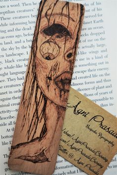 a bookmark with an image of a woman's face on it