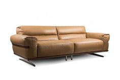 a brown leather couch sitting on top of a white floor