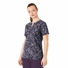 The Carhartt Women's Notch Print scrub top stays with the trend offering new and exciting prints scrub tops. This style offers all of the extras you expect from Carhartt with rugged durability yet a comfortable scrub top from a brand you can trust. The Polyester blend fabric offers lasting comfort and style while the pockets keep you organized and prepared for the task at hand. FeaturesStretch dobby fabric; 94% Polyester / 6% SpandexBuilt to move with Rugged Flex® stretch technologyNotch necklin Plus Size Workwear, Dobby Fabric, Scrubs Uniform, Carhartt Womens, Collar Bone, Womens Scrubs, Tractor Supply, Medical Scrubs, Work Wear Women