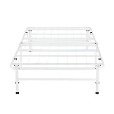 a white metal bed frame with no mattress