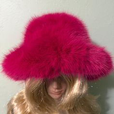 Beautiful Bright Pink Fluffy Hat. Very Soft and Warm. Fun Hat that is Fun to Wear.  Great addition to your wardrobe for Fall and Winter. It will keep you warm and make a fashion statement. This Hat is an Absolute Stunner it will turn heads.  Shape: Pom Pom Hat Size: small to medium Ribbon band adjusts to head size Material: Polyester Fluffy Hat, Fun Hat, Pom Pom Hat, Cool Hats, Hat Sizes, Bright Pink, Fedora, Fashion Statement, Caps Hats