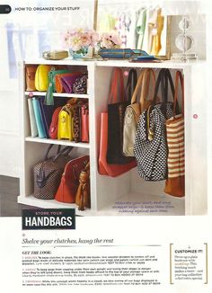 several purses and handbags are hanging on a shelf in a room with white walls