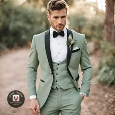 a man in a green suit and bow tie