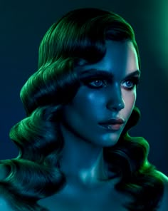 a woman with dark hair and blue makeup is shown in the image, she has green light on her face