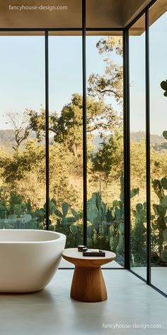 The seamless integration of materials such as wood and brass gives this bathroom a luxurious yet approachable feel.