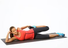 a woman is doing an exercise on a mat