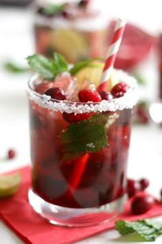 two glasses filled with cranberry lemonade and limeade next to a can of soda