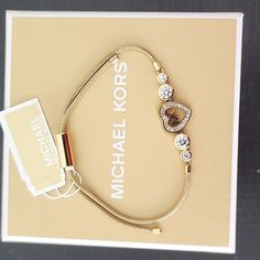 Michael Kors Goldtone Adjustable Bracelet Elegant Michael Kors Metal Jewelry, Michael Kors Earrings, Rose Gold Bangle Bracelet, Michael Kors Bracelet, Gold Michael Kors Watch, Monogram Bracelet, Locket Bracelet, Leather Bangle, Rose Gold Bangle