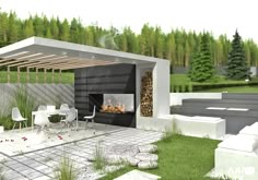 an outdoor fireplace in the middle of a garden