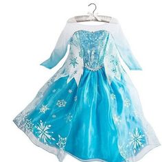 a frozen princess dress hanging on a wall