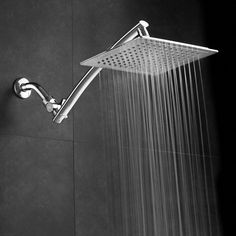 a shower head with water flowing from it