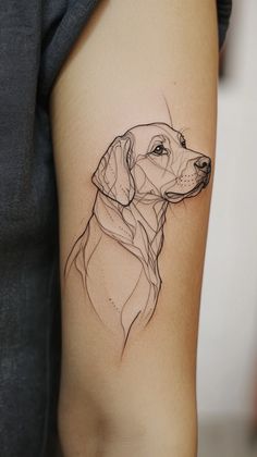 a dog's head is shown on the arm