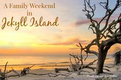 a family weekend in jekyll island with the sun setting over the water and trees