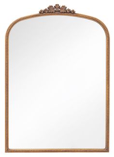 an ornate gold framed mirror on a white background