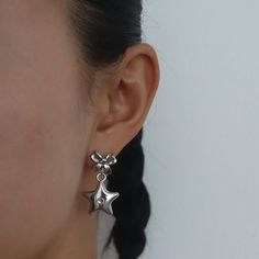 Silver bow earring studs with a pink gemstone star. MEASUREMENTS Earring size: 3 x 1.5 cm MATERIALS Material: Silver plated brass, cubic zirconNickel & lead free Bow Earring, Trendy Rings, Silver Star Earrings, Pink Gem, Pink Star, Trendy Ring, Silver Bow, Earring Studs, Custom Name Necklace