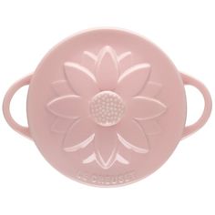 an image of a pink flower on the side of a baby pacifier holder for breastfeeding