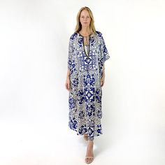 "A caftan is a perfect addition to any women's wardrobe. It can be worn day into night, as a stunning swimsuit cover-up at the beach, as well as a glamorous evening dress over a slip (sold separately in my shop), or over leggings. Made from airy silk, it is cool and airy, and great for warm weather. Hand beaded with ornate metal beads. Caftans are one size fits most, and look great on all shapes and sizes. Width is 45\" and length is 56\" from the center back neck to the center bottom edge." Chic Beach Season Loungewear Dresses, Silk V-neck Dress For Vacation, Summer Silk Kimono Flowy Fit, Flowy Silk Kimono For Summer, Flowy Silk Summer Kimono, Chic Silk Kaftan For Beach Cover-up, Bohemian Maxi Dress With Kimono Sleeves For Evening, Flowy Beachwear Dresses For Resort Season, Silk Dresses With Kimono Sleeves