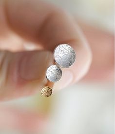 The Diamond Dusted Dot Studs by Christina Kober are simple everyday earrings that add a touch of subtle sparkle. The concave shape of the earrings captures and reflects light beautifully. Available in 3 sizes - large, medium, and mini. details mini studs measure 1/8" (4 mm) in diameter includes tension earnuts handmade by Christina Kober choose sterling silver or gold vermeil *What is Diamond Dusted? The diamond dusted technique is carefully applied by hand, by striking the metal with the back, Large Stud Earrings, Earrings Circle, Mini Studs, Everyday Earrings, Gold Vermeil, Dots, Sparkle, Stud Earrings, Sterling Silver