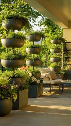 an outdoor patio with potted plants on the wall