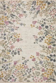 an area rug with flowers and leaves on it