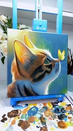 a painting of a cat with a butterfly on it's nose