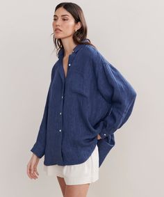 Relaxed Oversized Shirt ChambrayWith a dramatically oversized fit, this staple piece redefines style versatility. Tucked, untucked, or half-tucked depending on your mood—the Relaxed Oversized Shirt is as crisp and put together as it is effortlessly cool for any occasion.100% linen.Made in China of Italian fabric.Oversized button-up shirt with a generous fit to provide a relaxed look and feel. Oversized Feminine Outfit, Italian Summer Outfits Women, Women’s Oversized Button Up, Oversized Button Up Shirt, Outfits With Button Up Shirts Women, Oversized Button Up, Relaxed Oversized Button-up Shirt, Shirt Photoshoot, Oversized Style Women