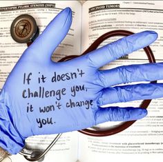 a blue glove with writing on it and a stethoscope