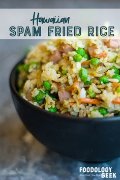 a bowl filled with fried rice and peas