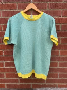 70s Dirtbag, Cheap Vintage Striped Shirt, Green Color Block Top For Loungewear, Color Block Cotton Sportswear Tops, Cotton Color Block Sportswear Top, Sporty Relaxed Fit Tops For Daywear, Vintage Color Block Crew Neck Top, Yellow Fitted Sportswear Top, Fitted Yellow Sportswear Top