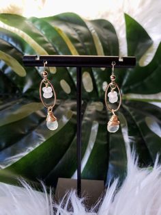 These gold and gemstone dangle earrings are elegant, lightweight and so feminine! Perfect for glamming up a look for a night out or special occasion. Details: Earrings are 1.75" long from tip of ear wires to bottom of dangles. Composed of 14kt. Gold Fill components, Moonstone Briolettes and Moonstone Rondelles. Ear wires are 14kt gold filled. Female handmade and designed in the USA. Wire Wrapped Teardrop Chandelier Earrings For Party, Teardrop Wire Wrapped Chandelier Earrings For Parties, Chic Teardrop Pierced Earrings, Wire-wrapped Teardrop Chandelier Earrings For Parties, Feminine Sterling Silver Dangle Jewelry, Chic Teardrop Earrings For Gift, Feminine Drop Earrings For Pierced Ears, Elegant Long Drop Metal Earrings, Delicate Dangle Crystal Earrings For Party