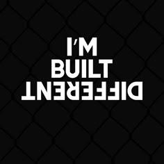 the words i'm built in white on a black background with a chain link fence