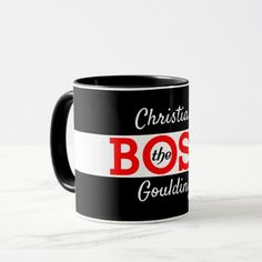 a black and white coffee mug with the canadian flag on it that says, hermanie the boss