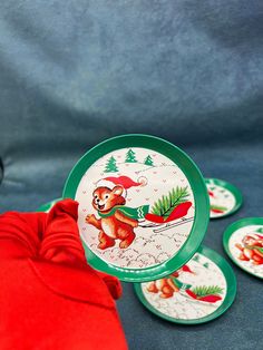 there are many plates with christmas designs on them