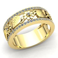 a yellow gold wedding ring with flowers and diamonds on the sides, set in 18k yellow gold